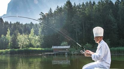 A chef is fishing